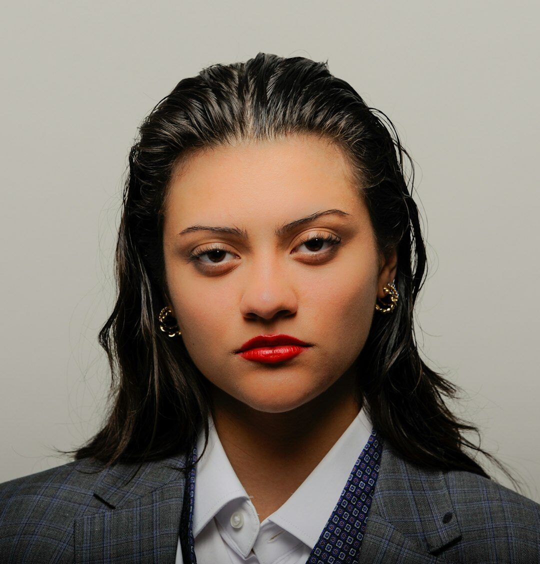 Professional female attorney in business suit smiling